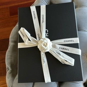 Chanel box with ribbon and signature flower